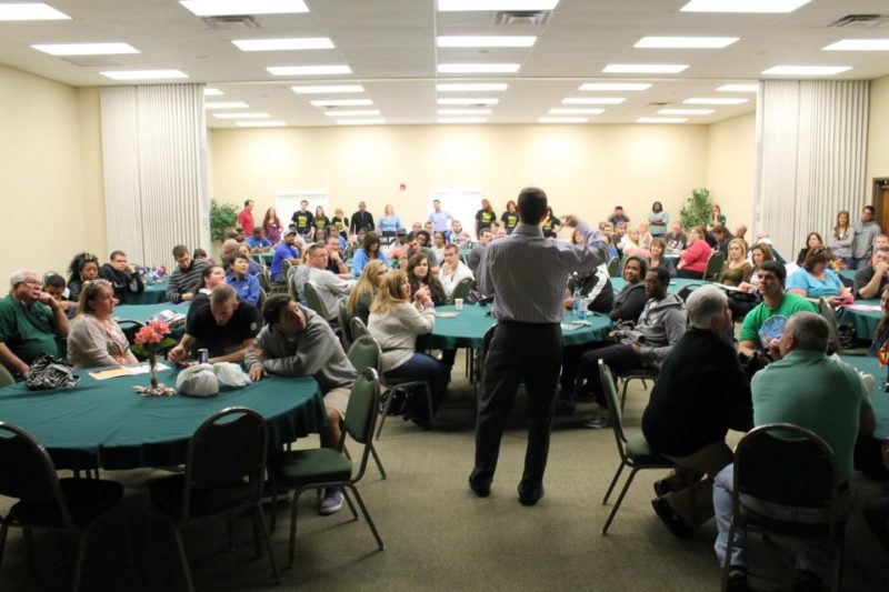 Ron speaking to audience.