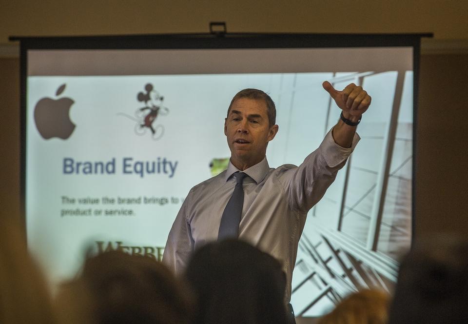 Ron speaking at branding workshop.